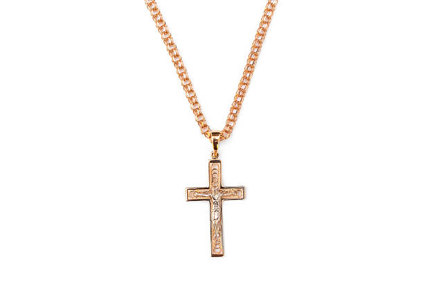istock Golden cross on golden chain. Isolated on white. 2233400940