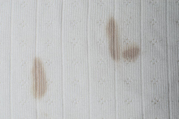 istock White fabric with visible blood stains creating detailed texture background for medical, forensic, and healthcare concepts 2233402402