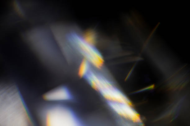 istock Rainbow Bokeh Prism Rainbow Light Flares Overlay on Black Background 2233407302
