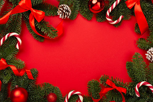 istock Christmas tree branches with festive decoration on color background, top view 2233410744