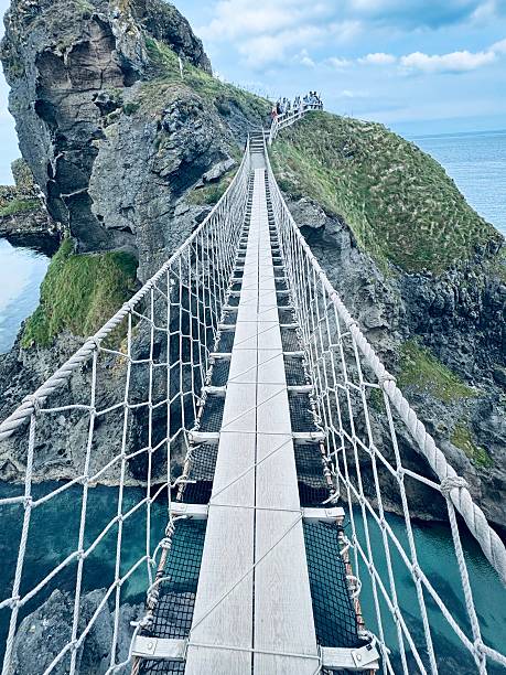 istock Carrick-a-rede rope bridge Giant Causeway Coast 2233411118