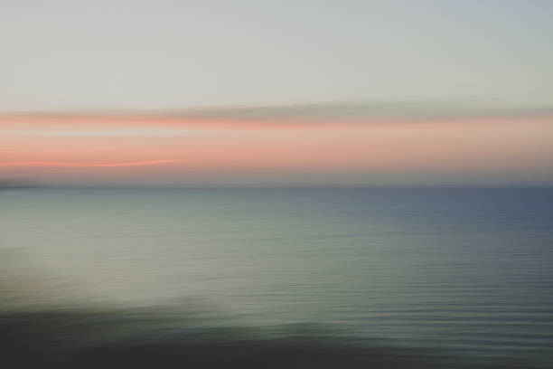 istock Blurred bokeh of sea landscape at sunset 2233418676