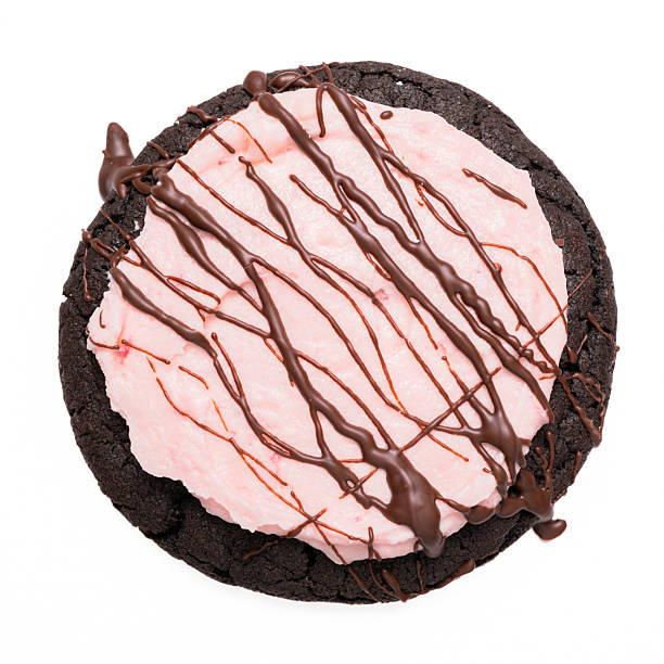 istock Cookie - Chocolate Drizzled Pink Strawberry Cookie 2233424331
