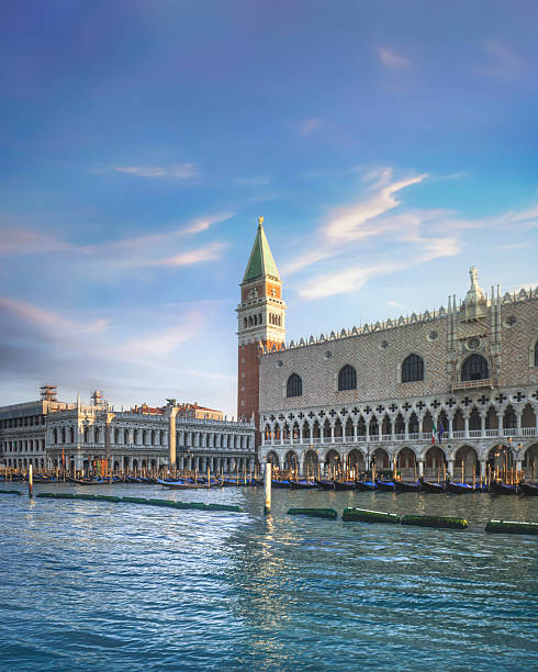 istock Venice Doge Palace and St Mark Campanile with gondolas at sunris 2233425574