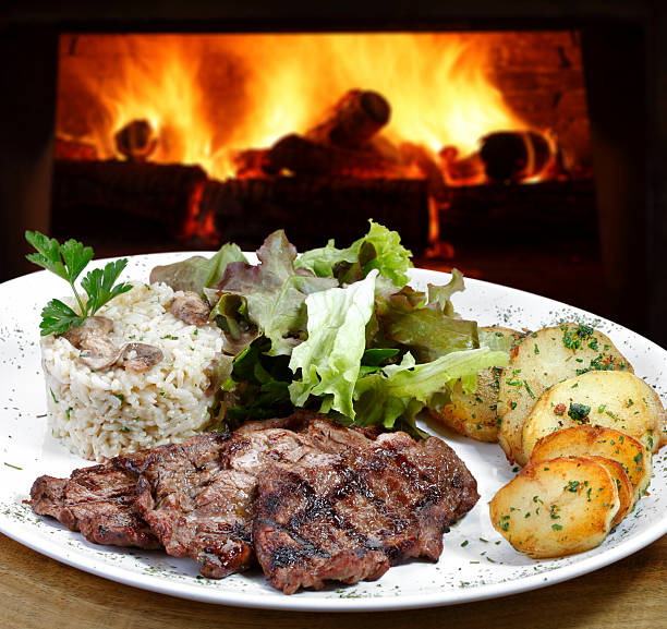Grilled steak, rice, salad and garnish