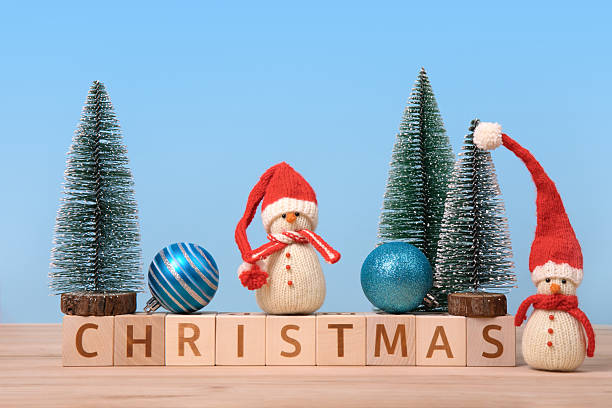 istock Christmas background with knitted snowmen 2233428184