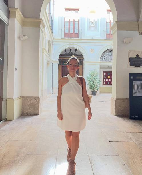 istock Woman in white dress 2233431191