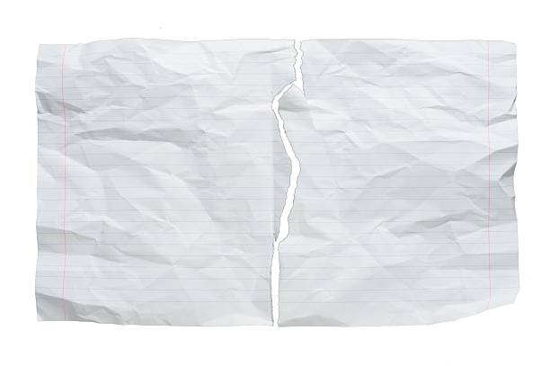 Lined torn school notebook sheet with rough ripped edges, blue horizontal lines on white background, isolated paper texture for notes, writing, scrapbooking, and projects.