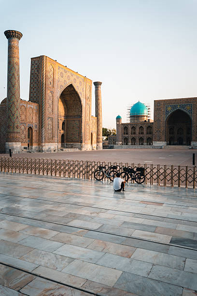 istock Bikepacker and  traditional monuments in Samarkand 2233440832