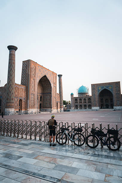 istock Bikepacker and  traditional monuments in Samarkand 2233440833
