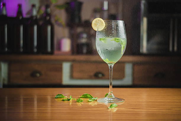 istock Mojito cocktail prepared on a table with a blurred background. 2233441597