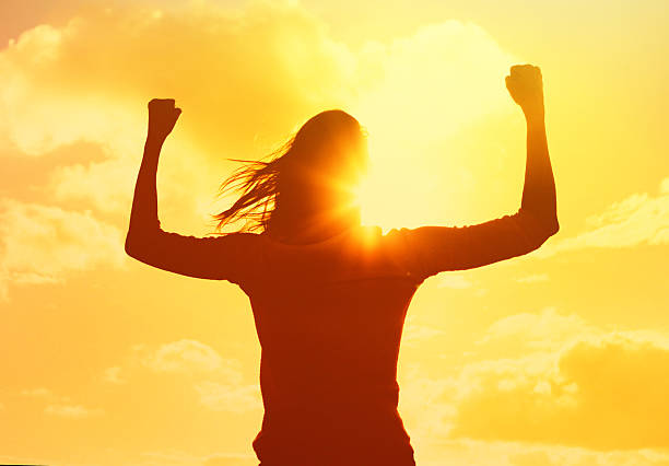 istock Confident strong woman against a sunrise. Powerful morning. 2233441777