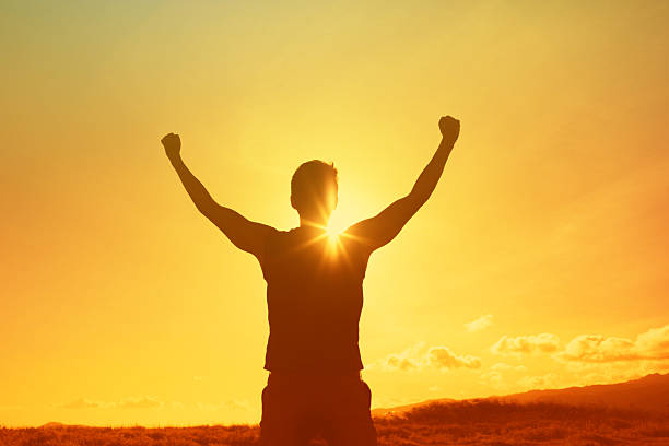 istock Strong man celebrating his success and achievement. 2233442060