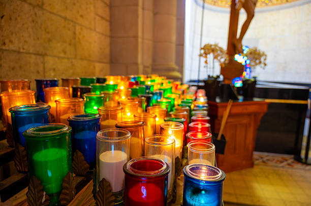 Close-up on candles in Ste-Anne-de-Beaupre Basilica