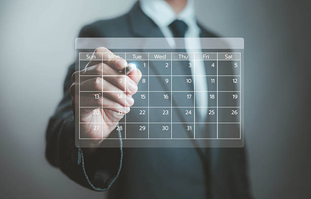 istock Business people use work schedules in business as a technological plan and project for proper planning and knowing the timeline of the work progress. 2233445664