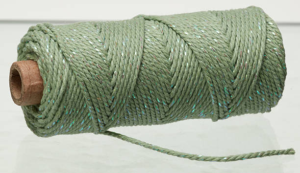 istock Roll of green rope isolated nature background with clipping path 2233446662