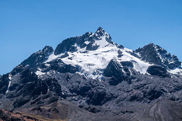 istock Snow-covered mountain peak in the Peruvian Andes 2233447459