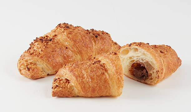 istock Croissant Bread isolated nature background with clipping path 2233447925