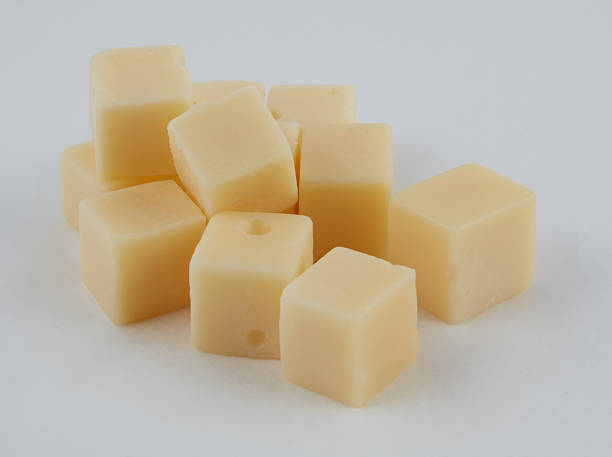 istock Cheese cubes isolated nature background with clipping path 2233447993