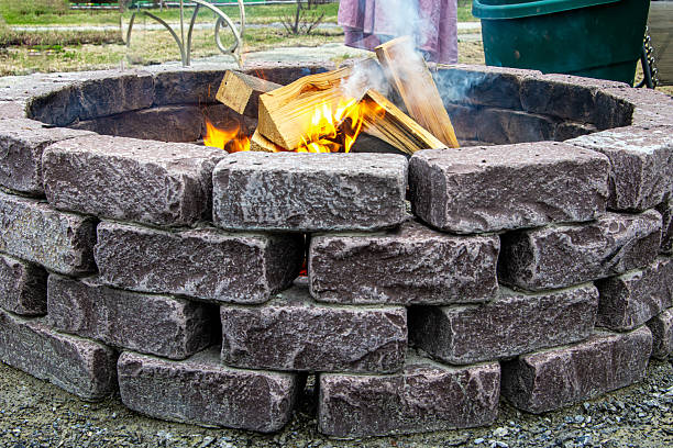 A daytime campfire in the summer.