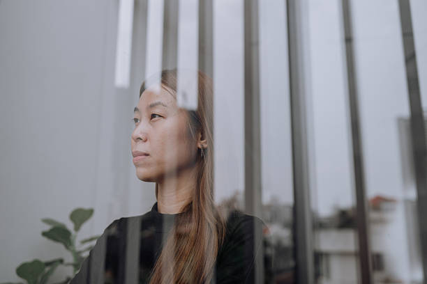 istock A City's Shadow, a Woman's Gaze 2233450928