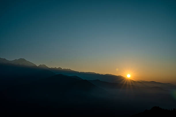 istock Gloomy Sunrise over the Moutnain 2233451311