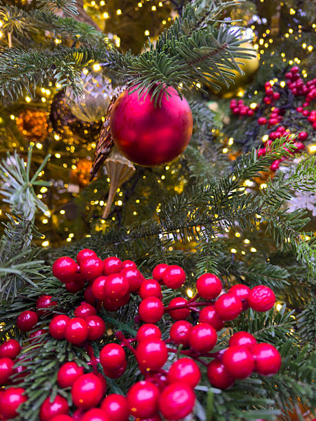 istock A red ball ornament hangs on a Christmas tree 2233462537