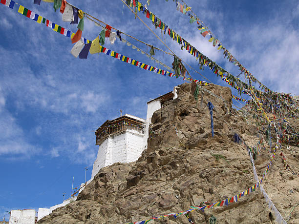 istock Tsemo Castle enthroned above Leh and prayer flags, India. 2233466229