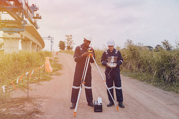 istock Surveying engineers use cameras and drones to survey road and high-speed railway construction sites or conduct safety inspections. 2233466371