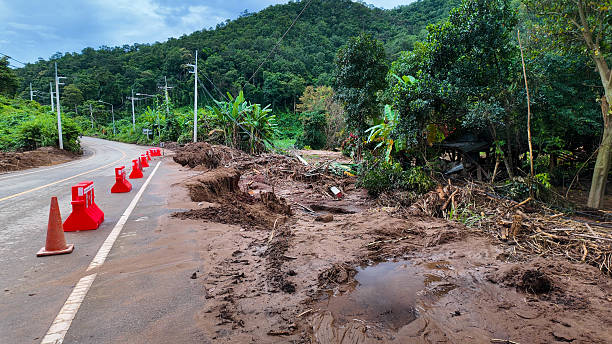 istock Flood Damage and Erosion Along Mountain Road 2233468087