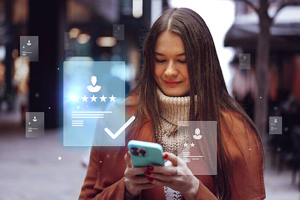 istock Young woman interacts with mobile phone displaying digital reviews in urban setting during evening hours 2233469501