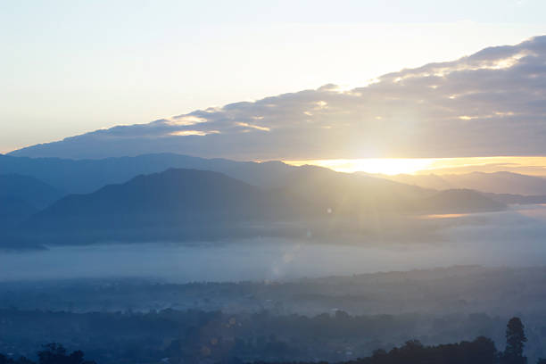Natural background blurring warm colors and bright sun light.
