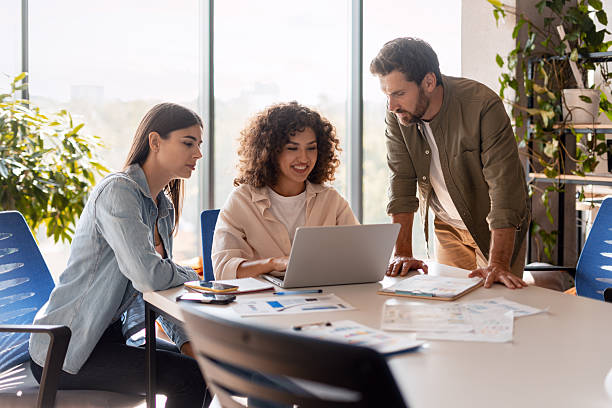 istock Business people working together on a project using laptop in the office 2233472298