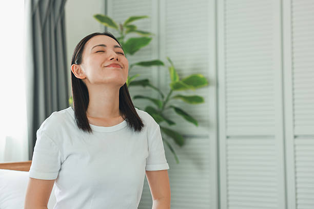 istock Woman taking a deep breath 2233472888