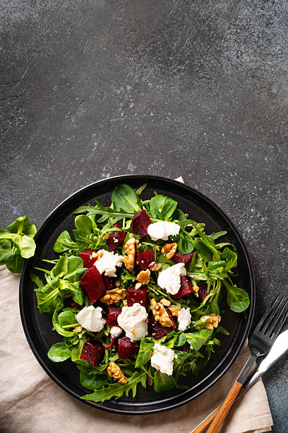 Fresh salad with beetroot, arugula and cheese
