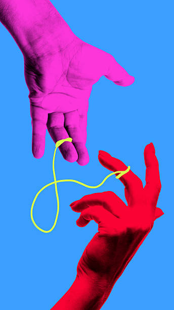 istock Colorful collage. Hands connected with string symbol of relationship connection and bond 2233475414