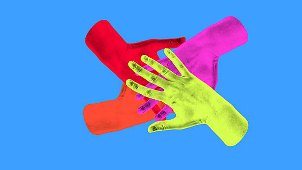istock Minimalist collage. Colorful teamwork hands joining together in unity symbol of collaboration 2233475415