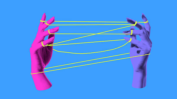istock Collage of two hands tied with string pattern symbol of play communication and complexity 2233475419
