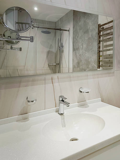 istock Modern bathroom interior in an apartment or hotel. Vertical photo. 2233477590