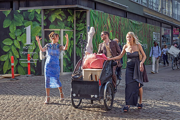Multi ethnic group of happy people in the movie theater, watching comedy.