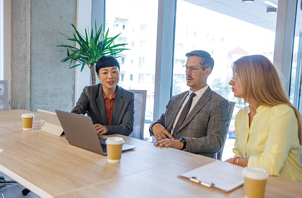 istock Businesspeople having a meeting in the office 2233480472