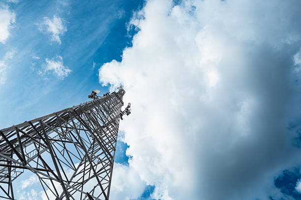 Newly erected 5G and Microwave broadcasting and line of sight antenna tower seen within a government secure facility. Note the LOS Microwave dishes.