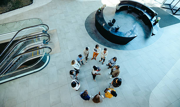 istock Corporate team meeting in modern reception area 2233484237