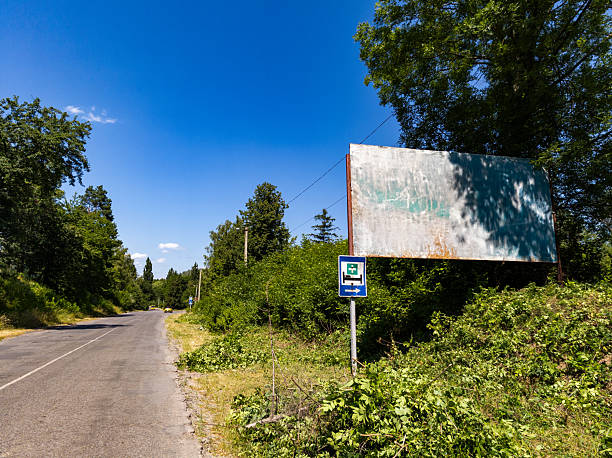 istock A Billboard on the side of a road next to a forest 2233485537