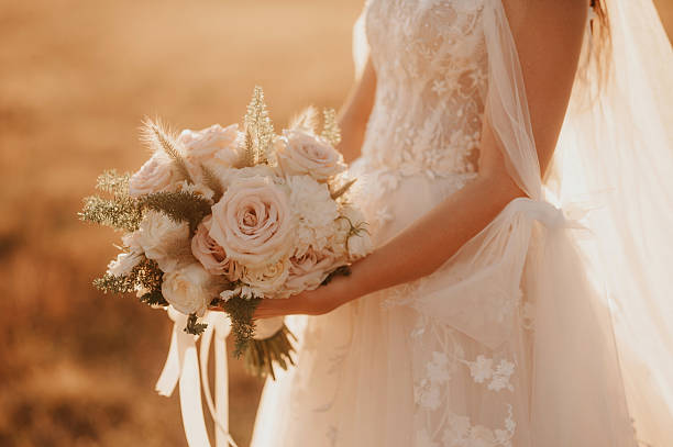 istock Bride holding a beautiful bouquet 2233487382