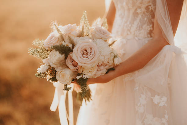 istock Bride holding a beautiful bouquet 2233487386
