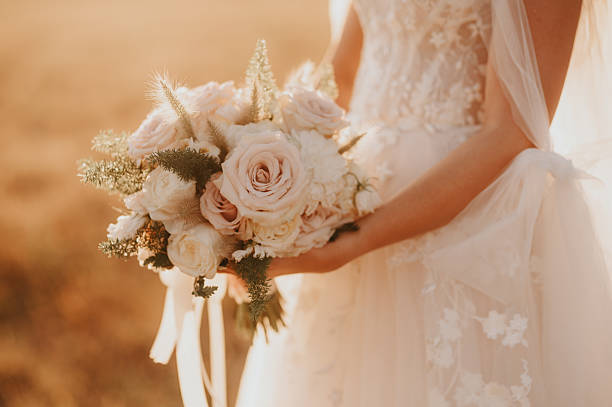 istock Bride holding a beautiful bouquet 2233487391
