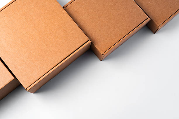 istock Lot of cardboard boxes on white background 2233492336