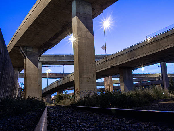 istock Modern Concrete Overpasses and Railway Tracks at Dusk 2233494187