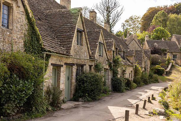Castle Combe village and By Brook river, Wiltshire in the England Cotswolds, the historic area has not new houses since 1600 and was England's prettiest village in 1961
